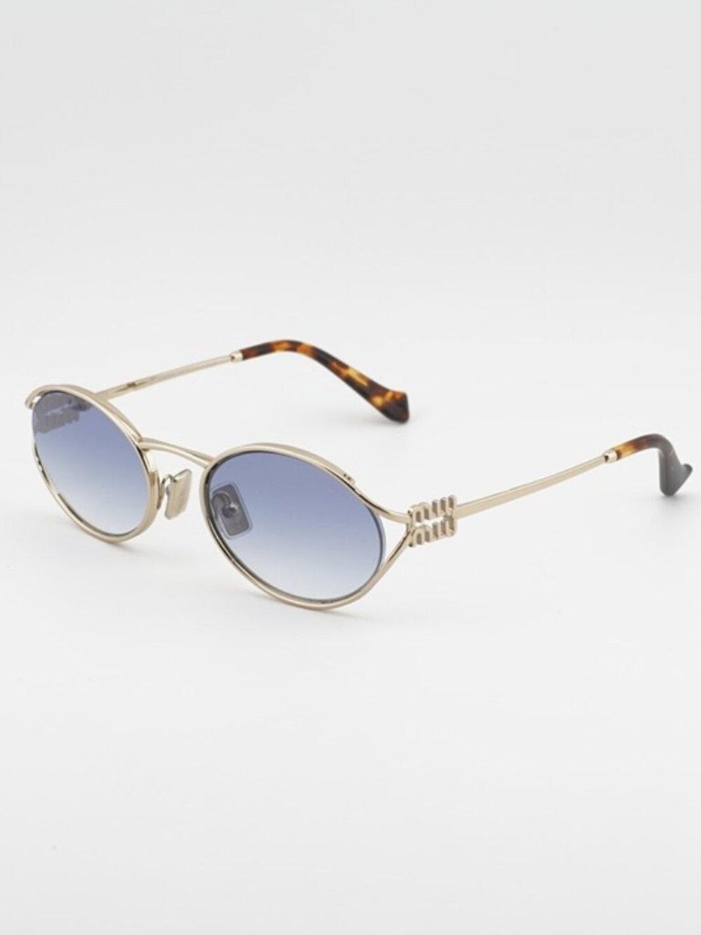 Miu Miu MU52YS ZVN80O Sunglasses Gold Oval Frame, Blue Gradient Lenses